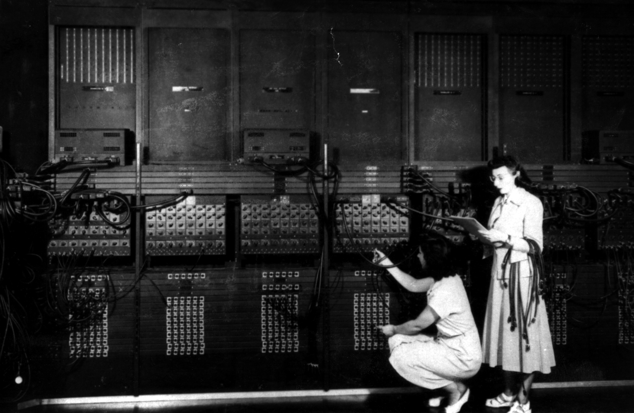 Two women wiring the right side of the ENIAC with a new program, in the 'pre- von Neumann' days